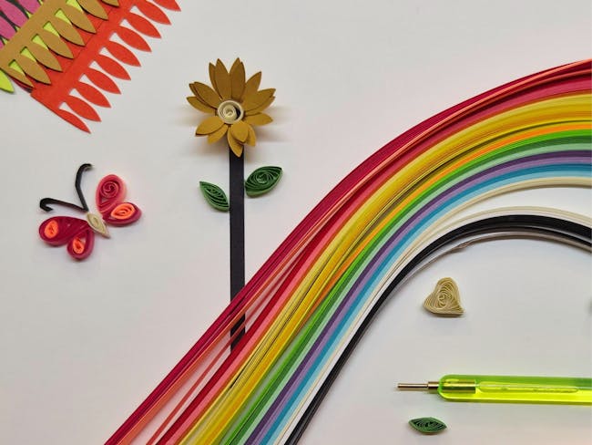 strips of paper rolled into flowers