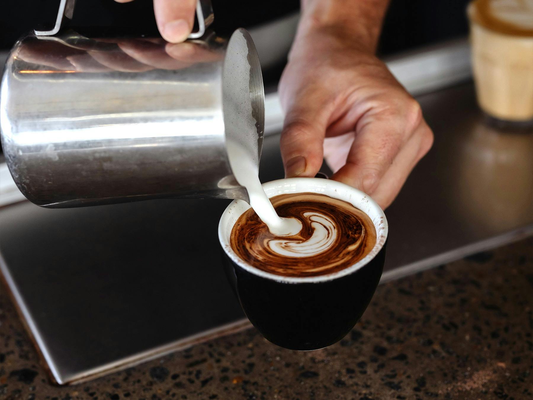 Savour the perfect cappuccino at Thynk Café + Bar, crafted with rich, aromatic coffee