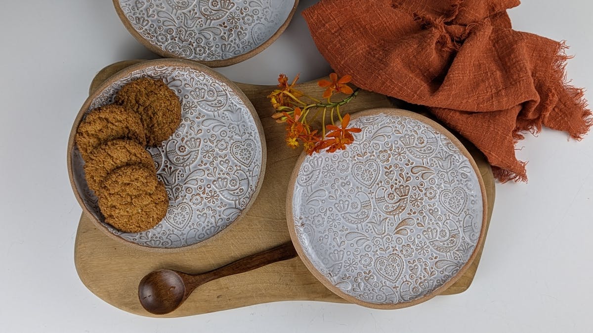 textured plates in white by PJ Pottery