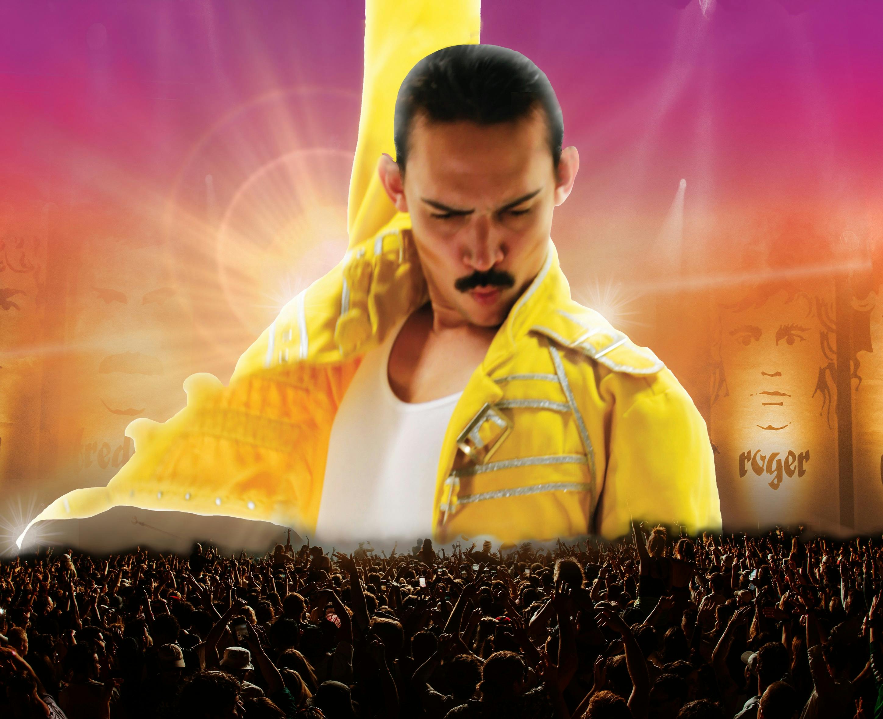 Photo of a Freddie Mercury impersonator wearing a yellow jacket, striking a pose.