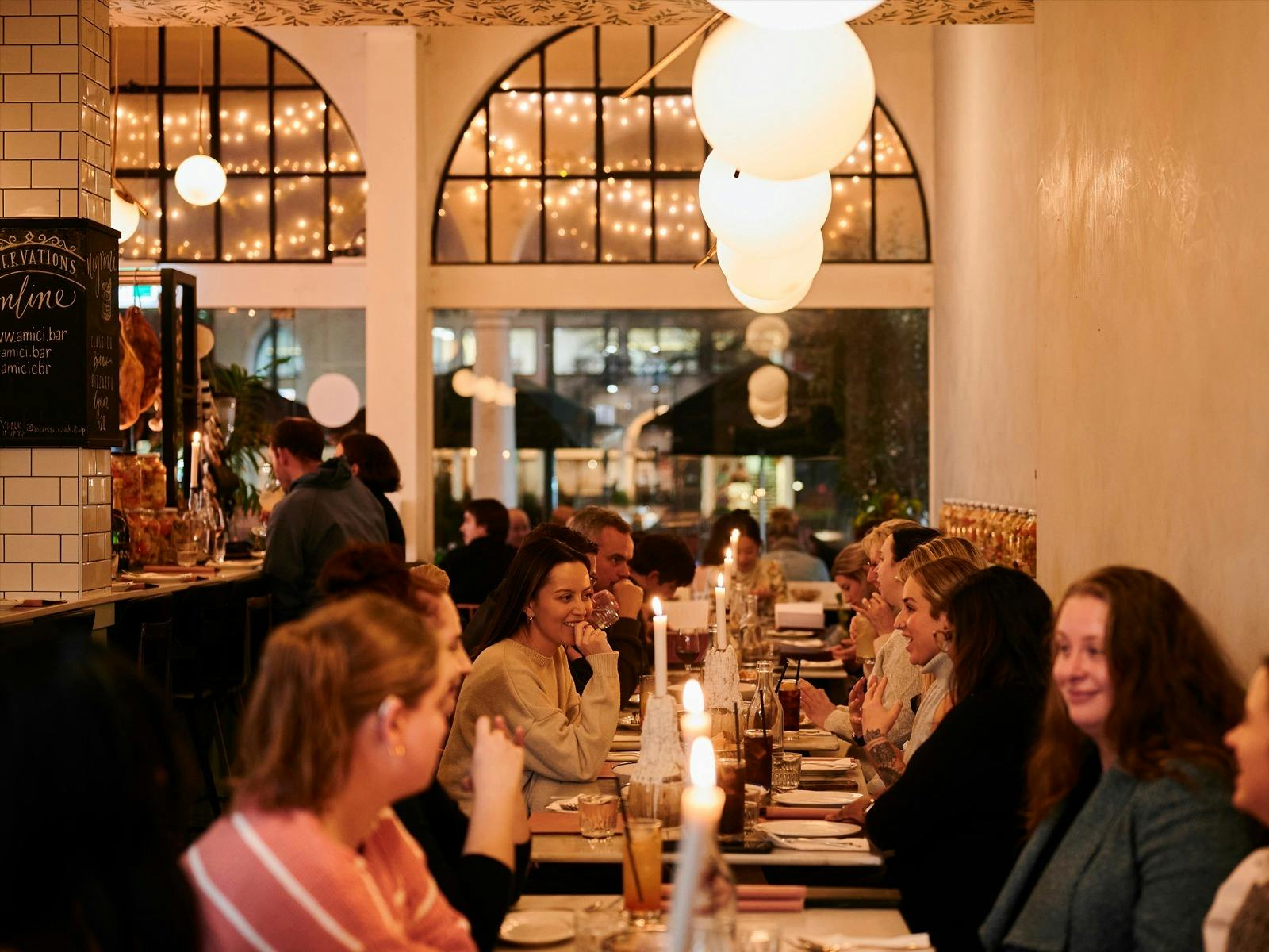 Group of people eating in Italian restaurant
