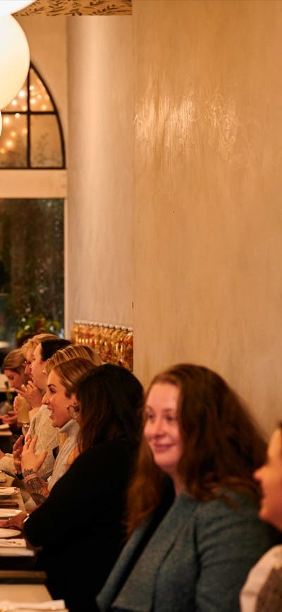 Group of people eating in Italian restaurant