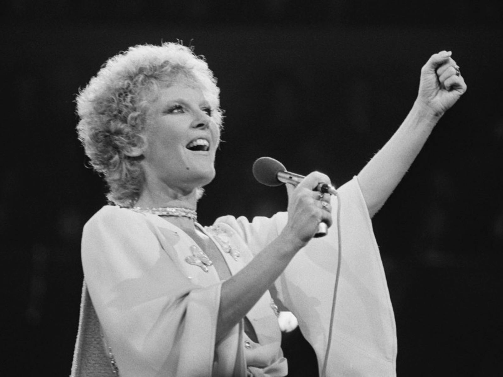 black and white picture of a female singing