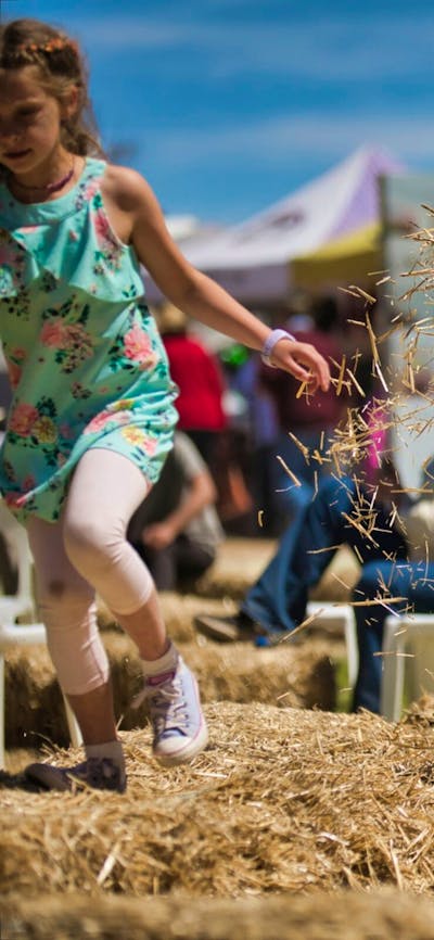 Child throwing straw