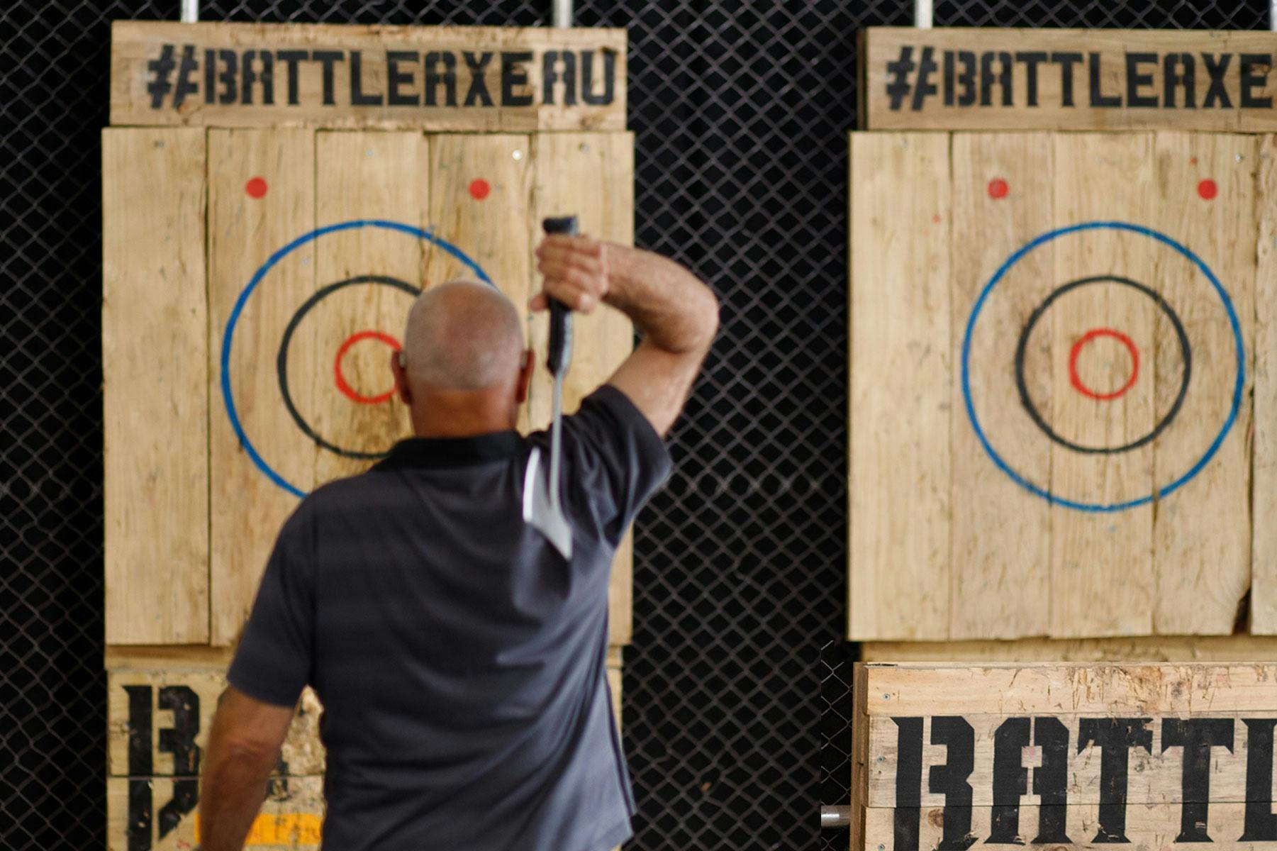 Family session throwing together at Battle Axe Throwing in Wollongong