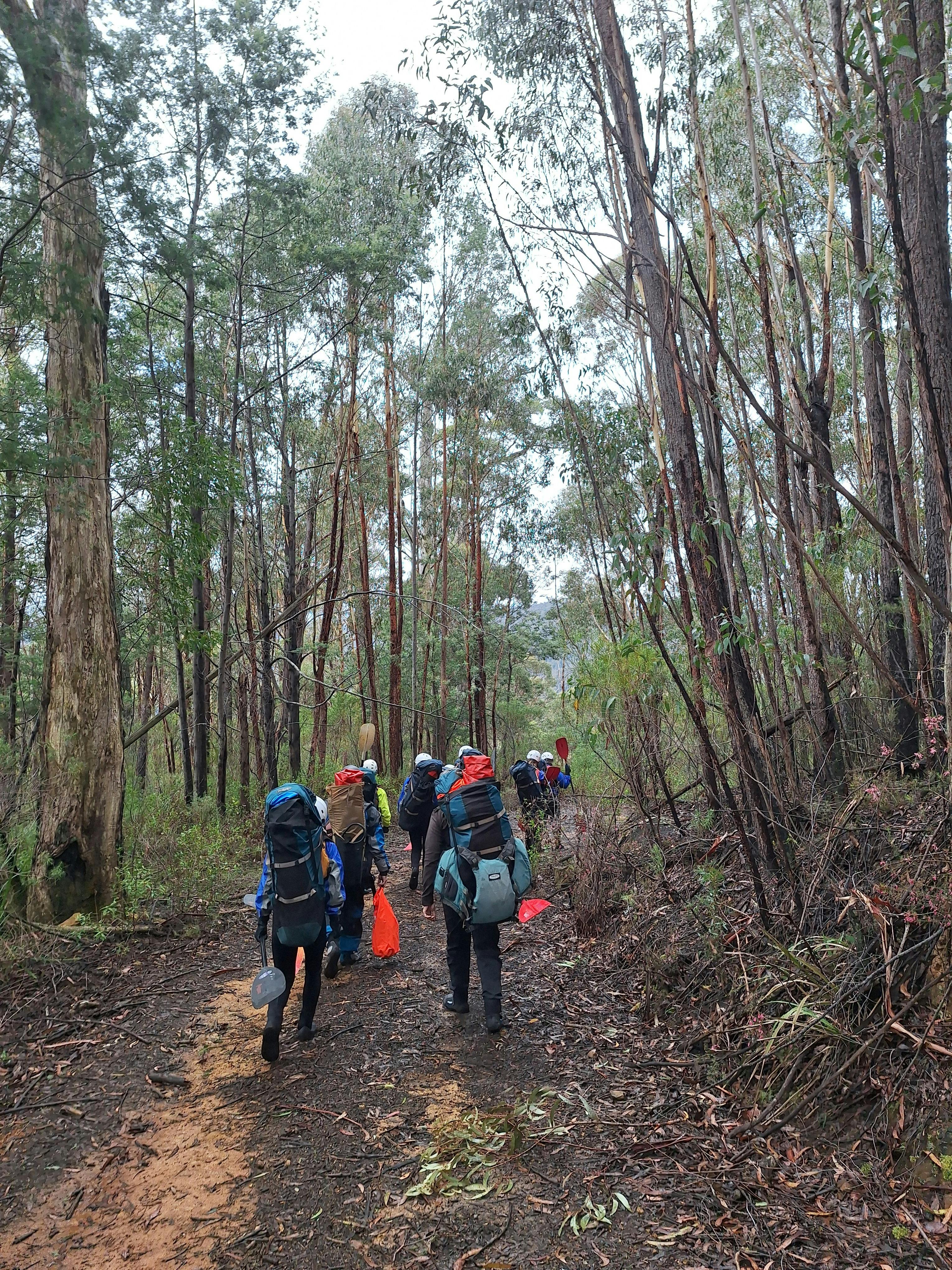 walking is part of packrafting outback rivers