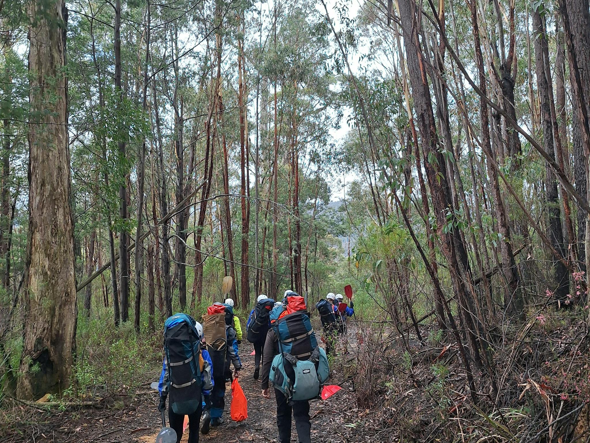 walking is part of packrafting outback rivers