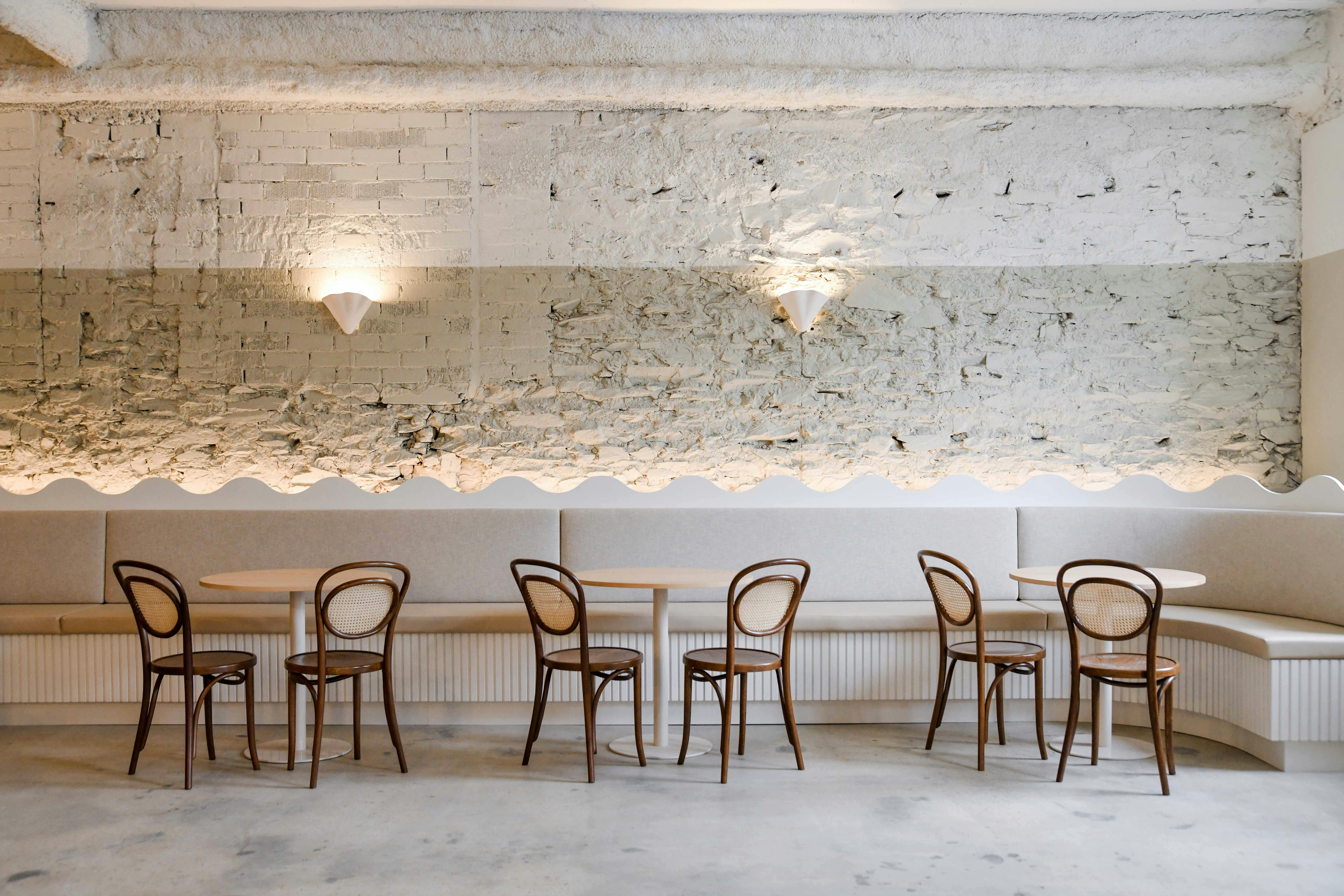 The interior of The Light Room Bar with booth seating