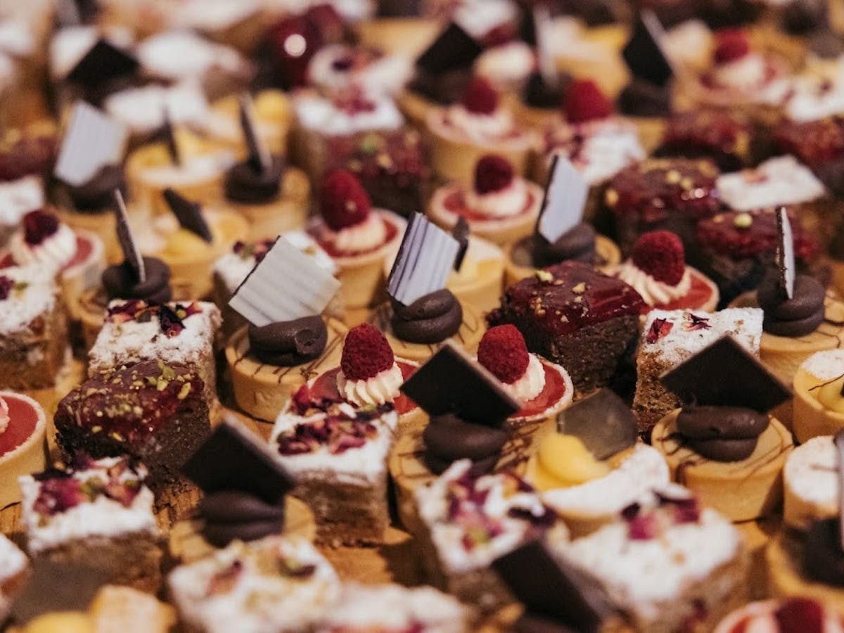 A tray of a variety of Petit Four pastries