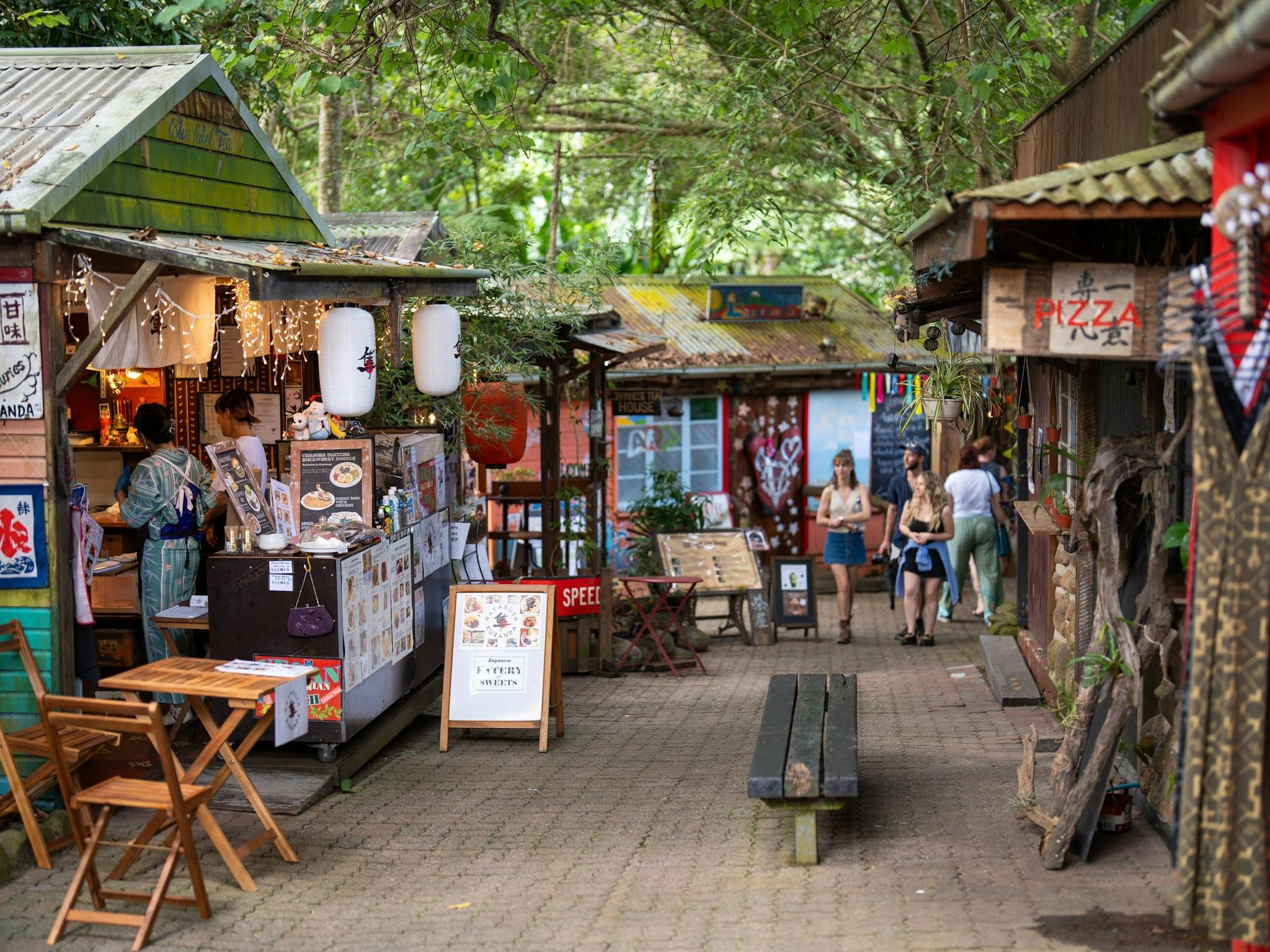 Market stalls in Kuranda, Village in the Rainforest, Tropical North Queensland. Market stalls in Kuranda, Village in the Rainforest, Tropical North Queensland.