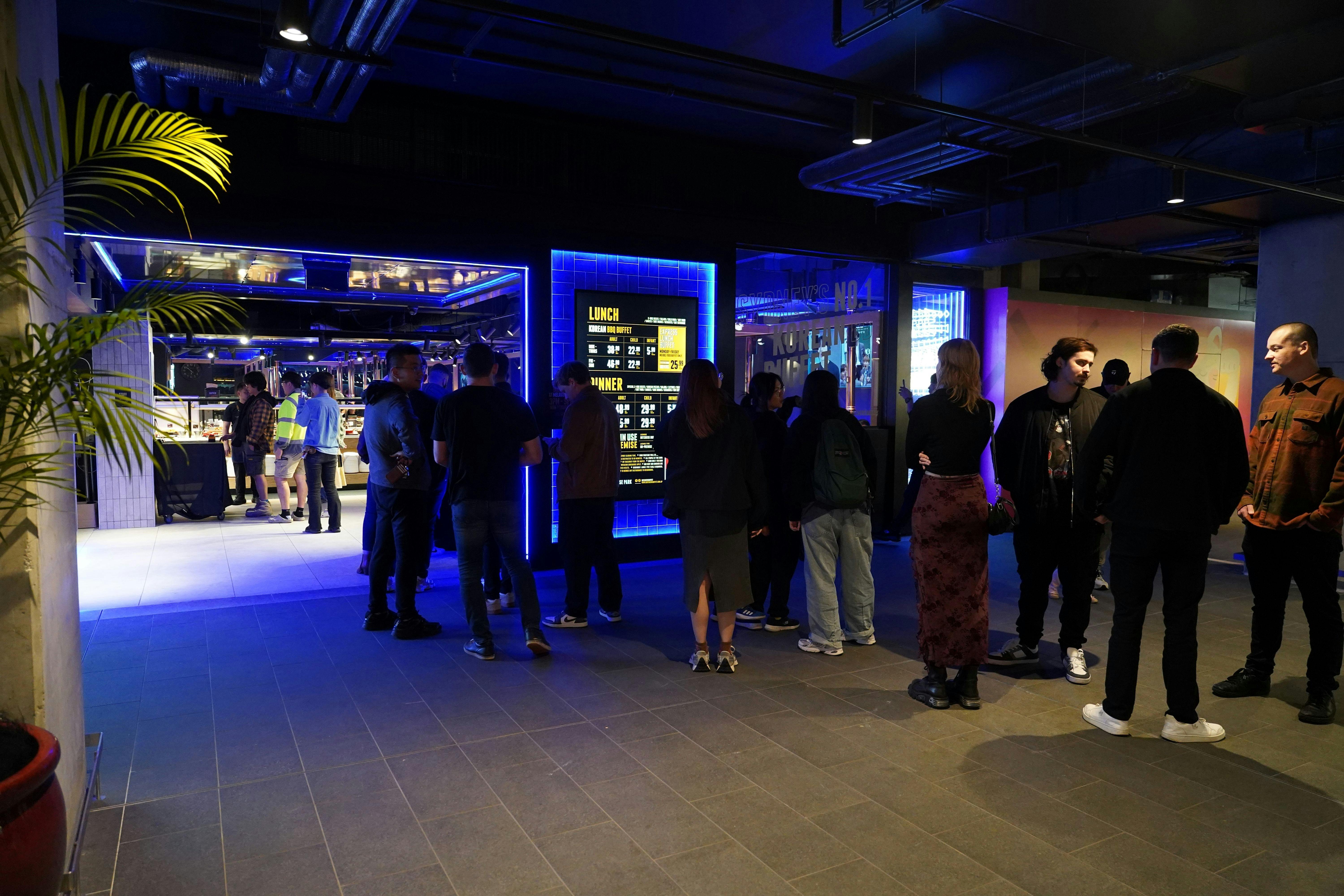 Guests waiting in line outside Butchers Buffet Melrose Park