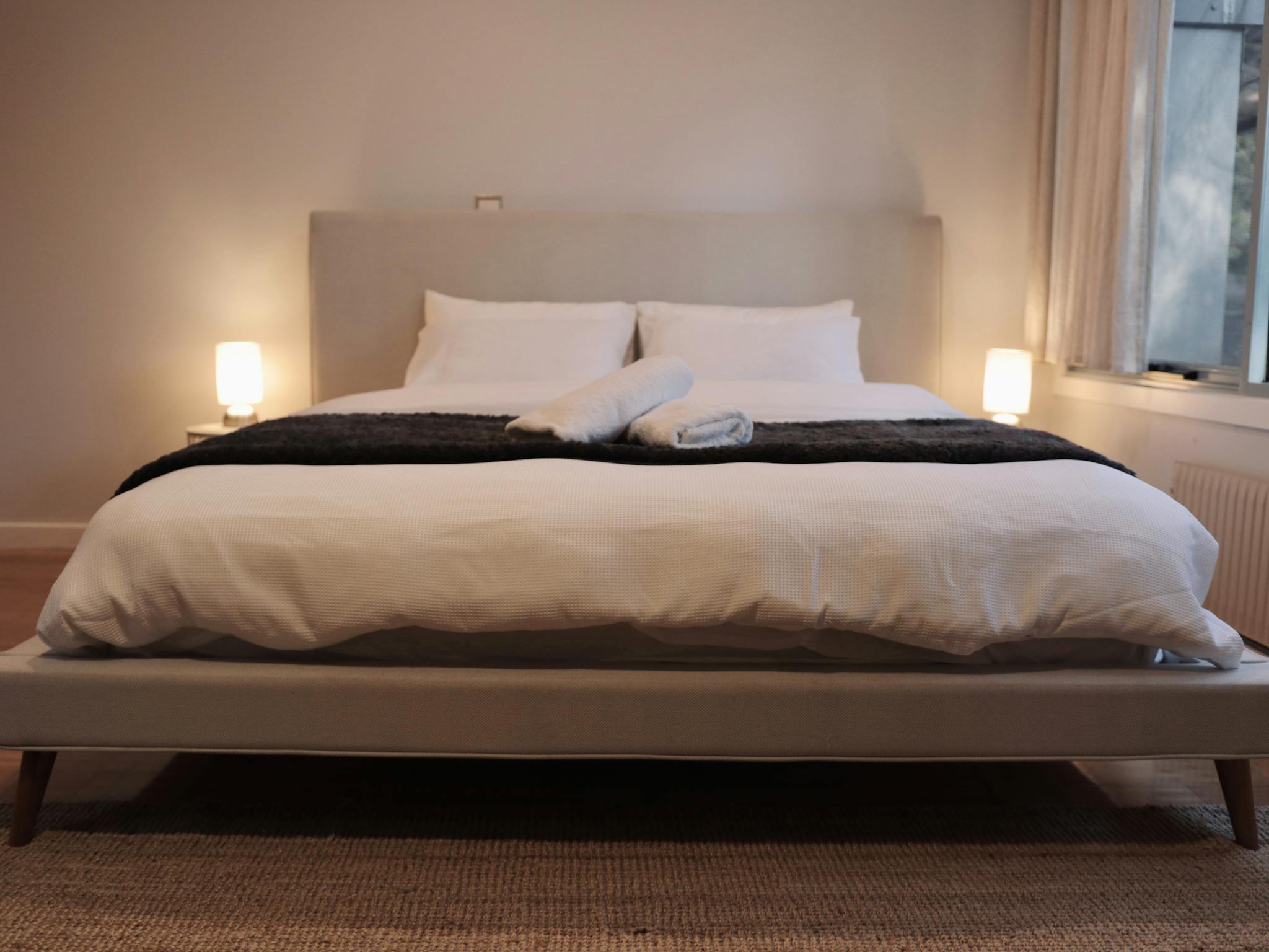King bed master bedroom ensuite accommodation airbnb designer a frame