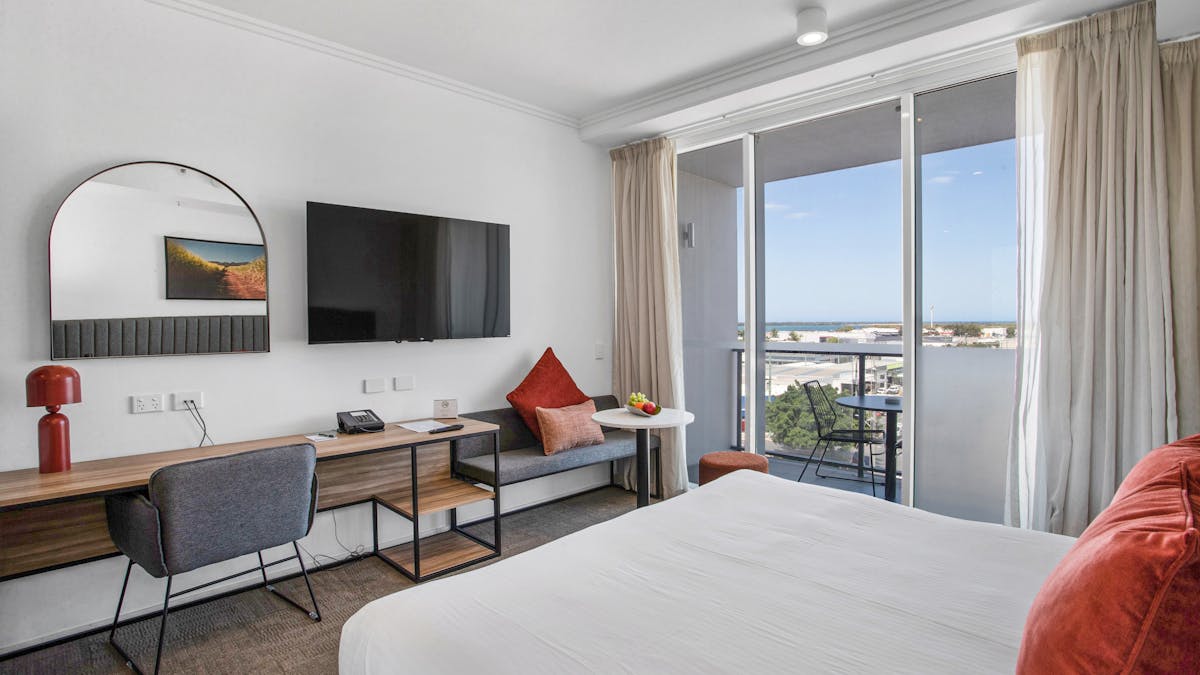 Open plan Studio Executive Apartment, complete with work desk and flooded with natural light.