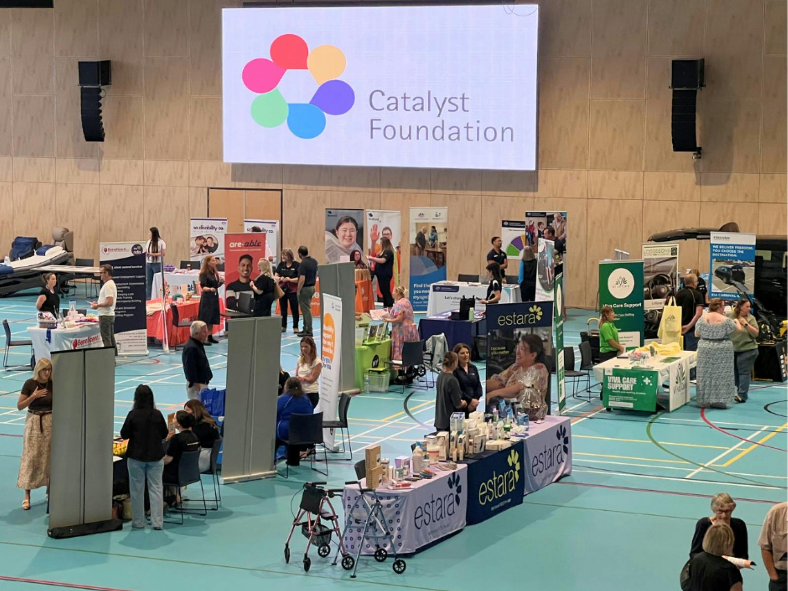 Exhibitor booths set up in venue