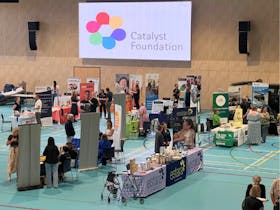 Exhibitor booths set up in venue