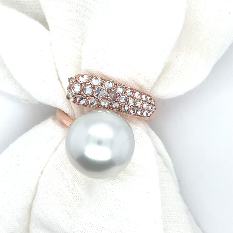 Rose gold dress ring featuring South Sea pearl and reverse set diamonds