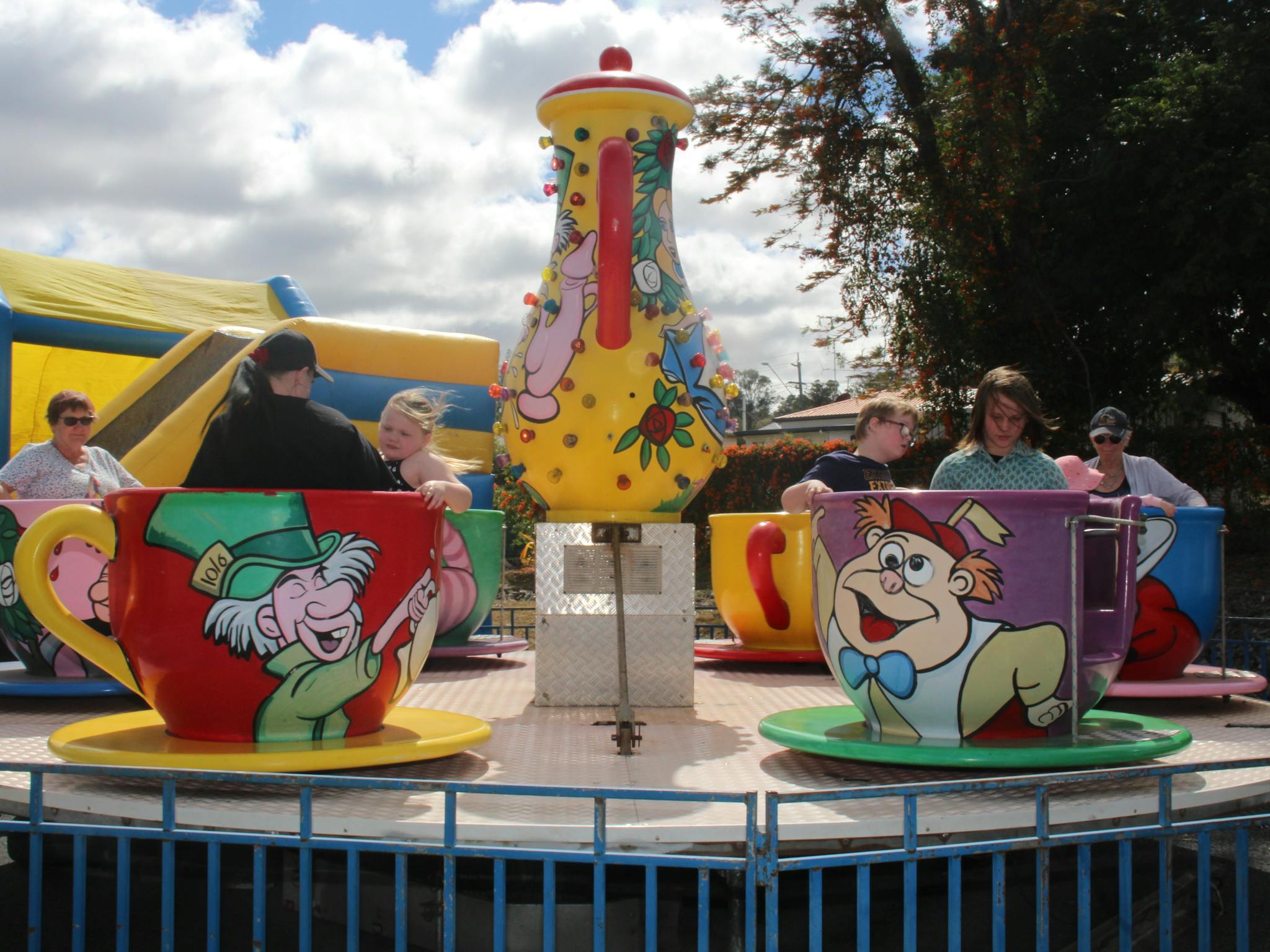 Some local children make the most of the free amusement rides at the 2021 Wattle Day Festival Some local children make the most of the free amusement rides at the 2021 Wattle Day Festival
