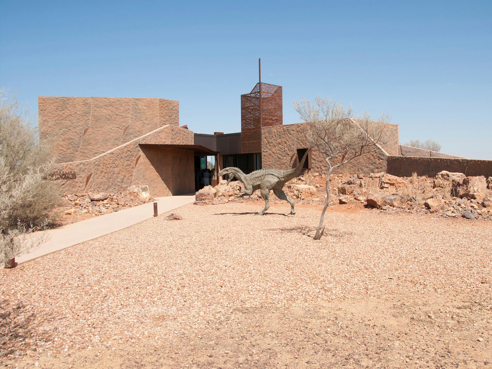 A visist to Australian Age of Dinosuars museum building with life sized dinosaur at entry