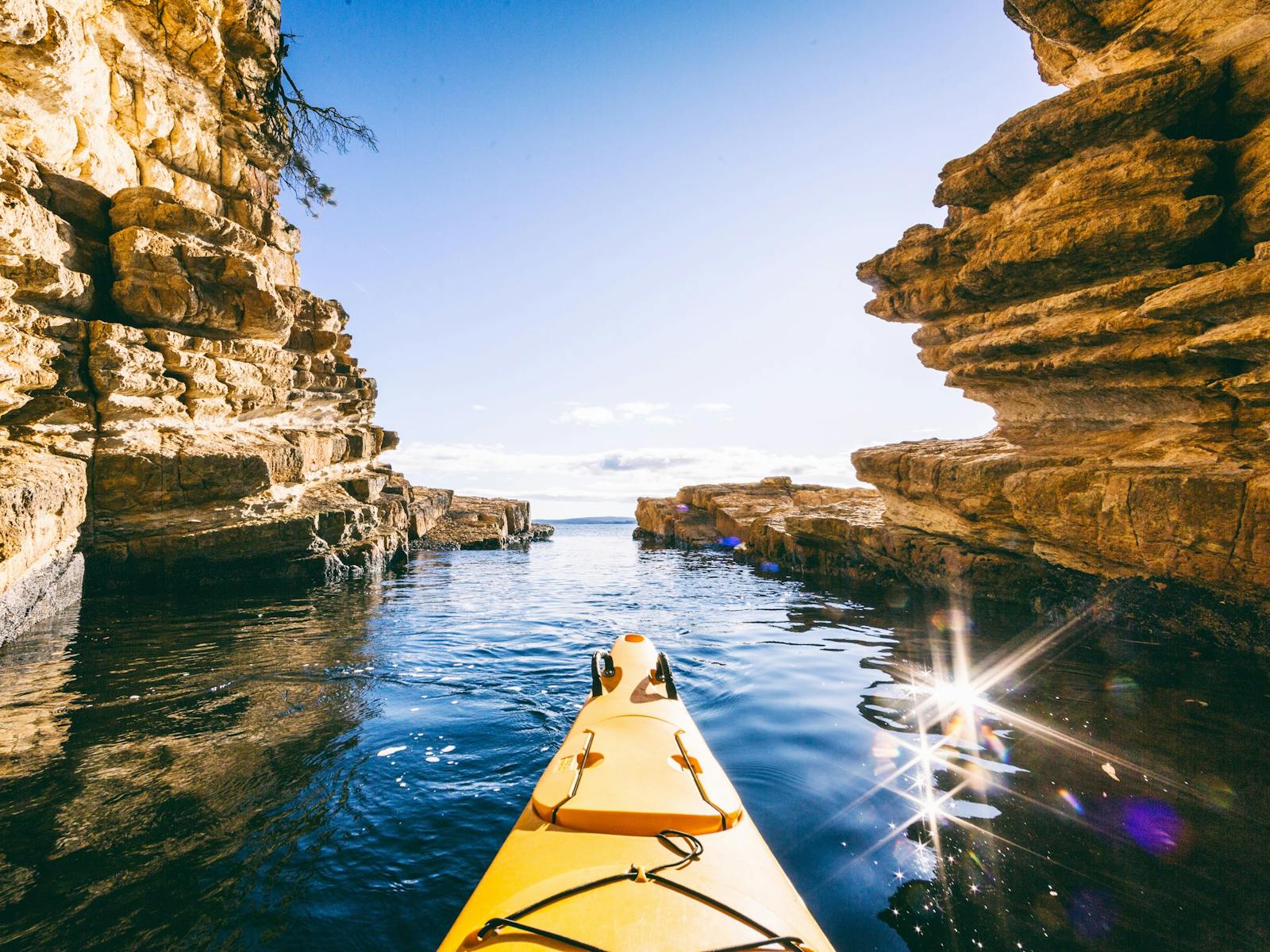 Kayaking in caves along Hobart's Derwent River