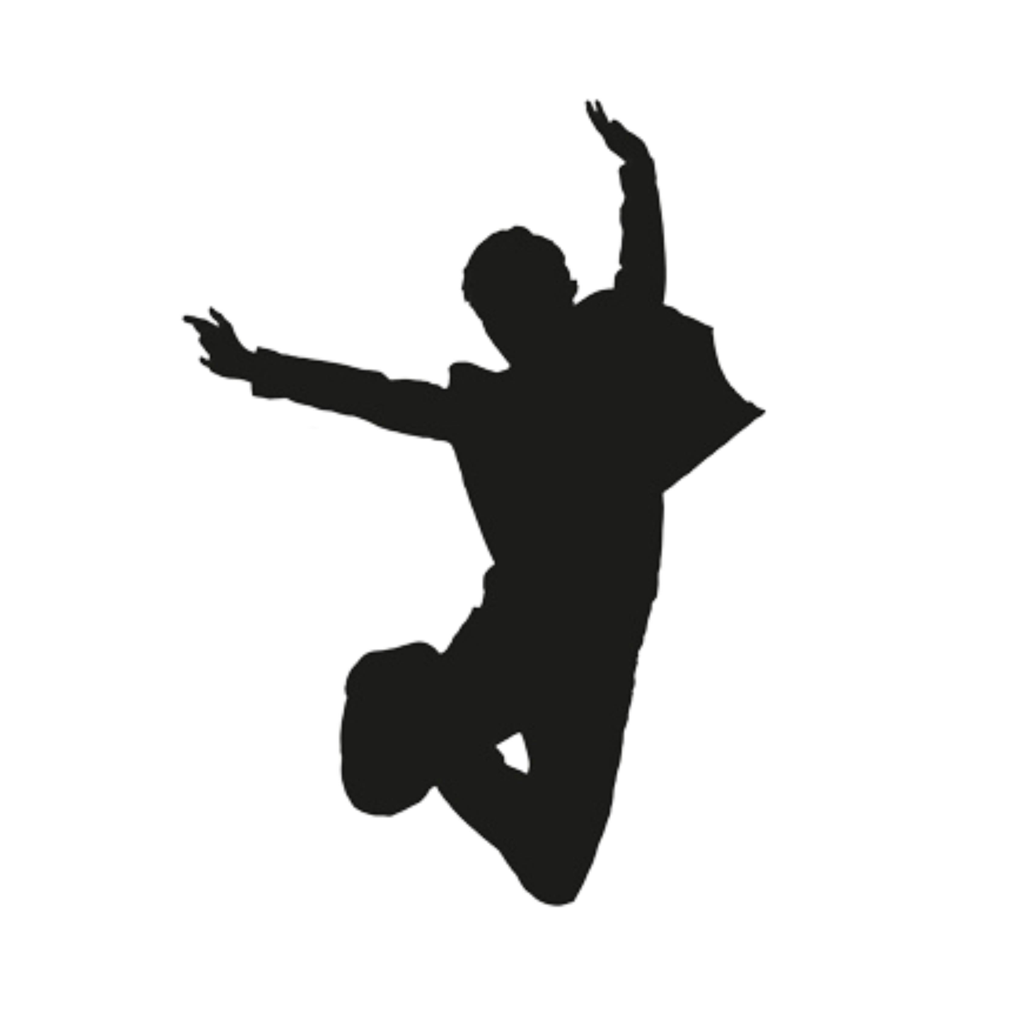 Silhouette of a boy jumping joyfully.