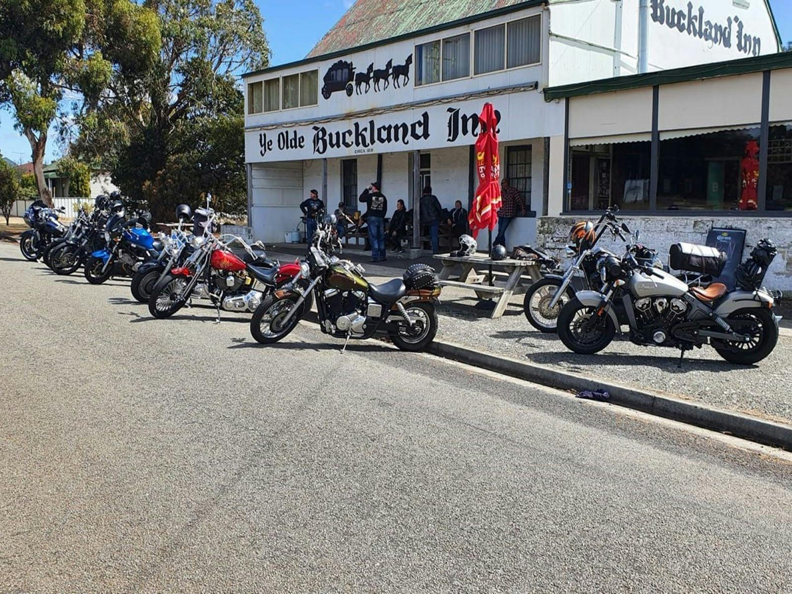 Visiting Bikes enjoy a relaxing drink at the Buckland Inn