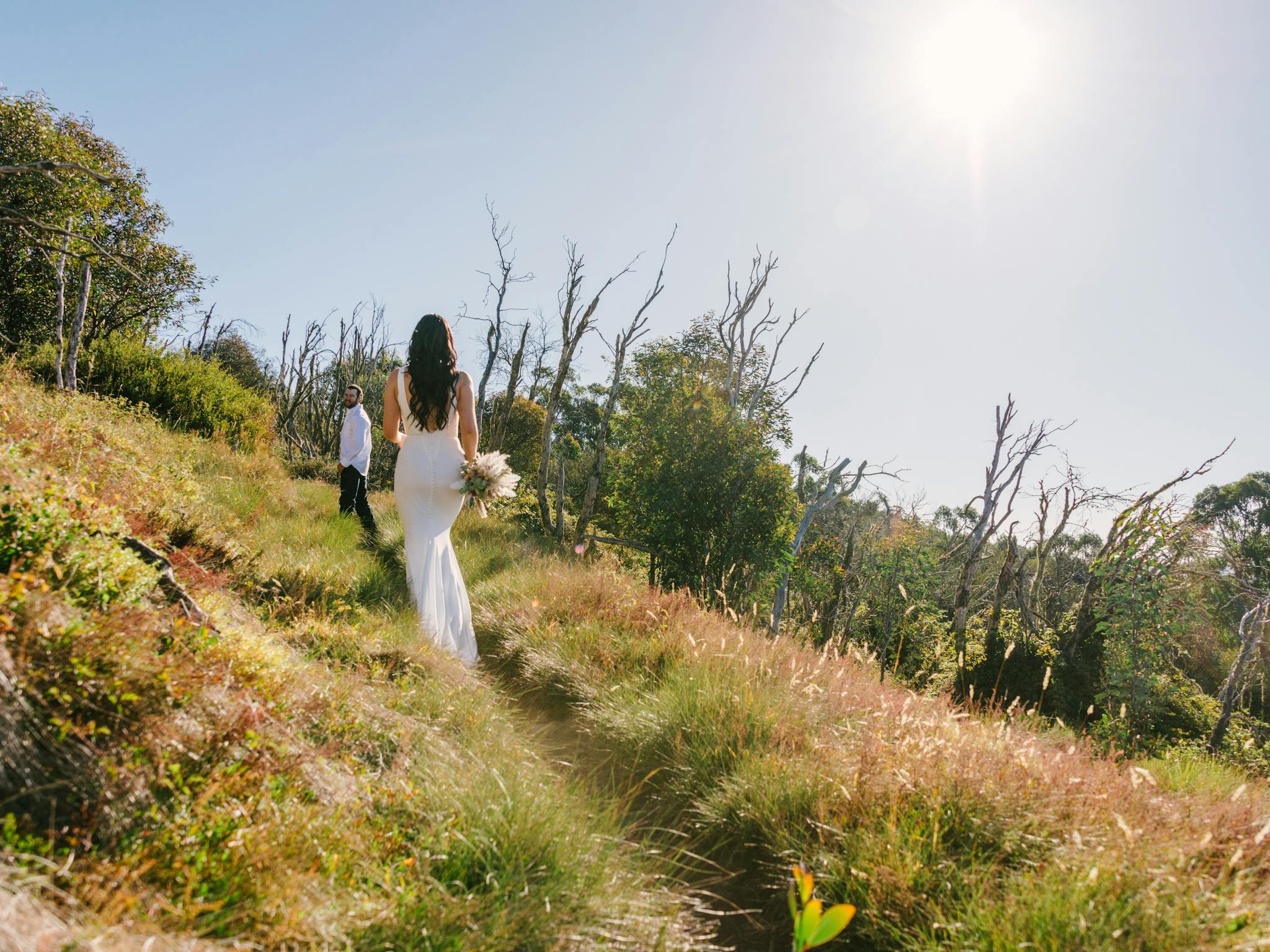 Bride and groom on the trail, heading up to Craig's Hut.