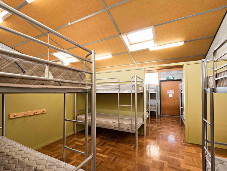 The Tony Balthasar Lodge's dormitory rooms are spacious and clean, ideal for larger groups.
