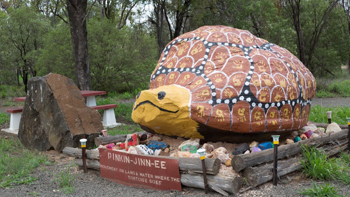 A large rock painted as a tortoise