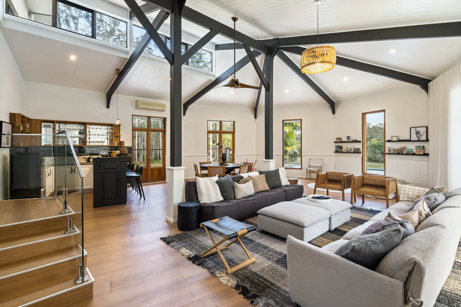 A large tranquil living space equipped with a bar.