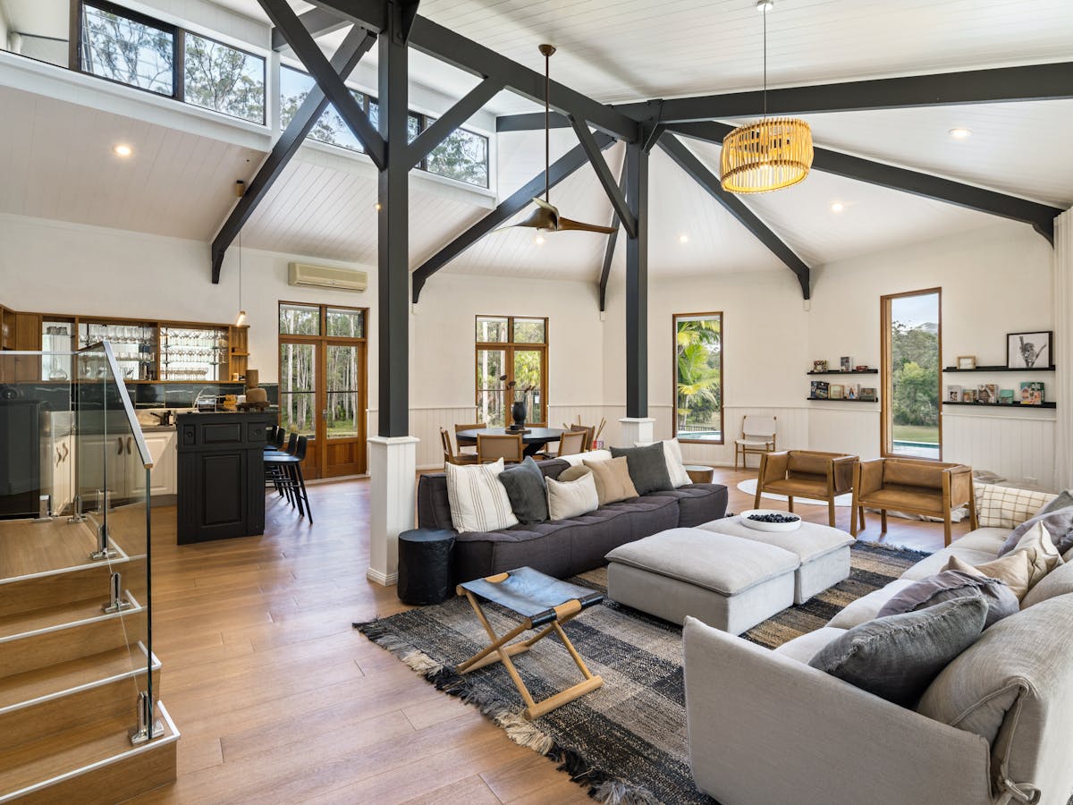 A large tranquil living space equipped with a bar.