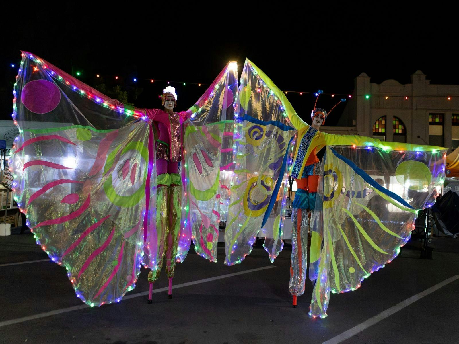 Butterfly stilt walkers