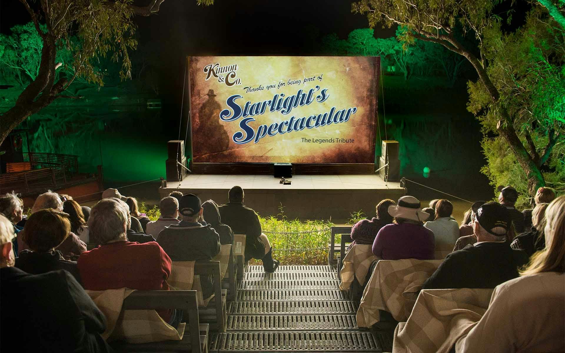 Guests sitting in front of a screen showing the Starlight's Spectacular Picture Show