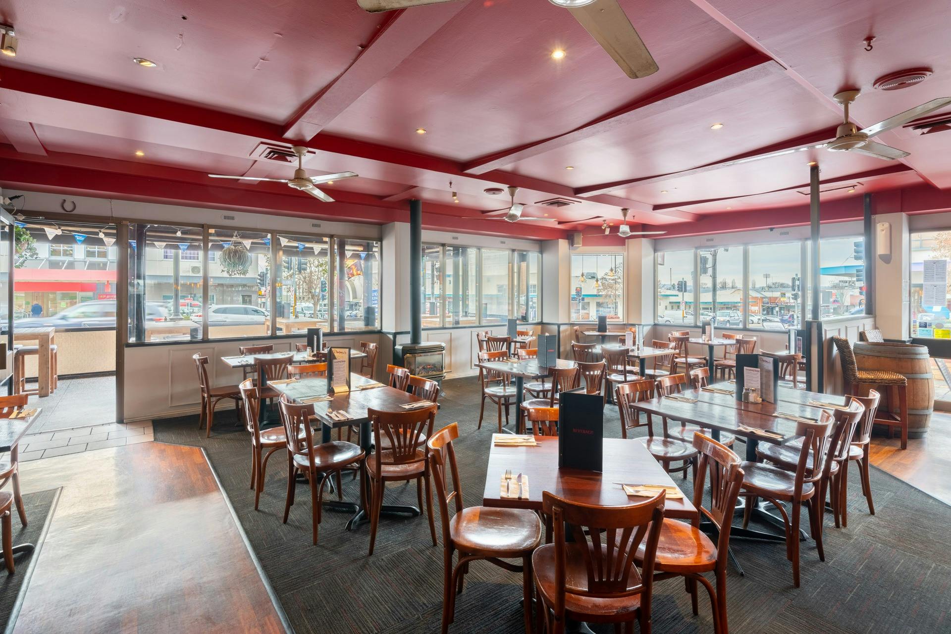 The main dining area of the restaurant has a fire place for winter.