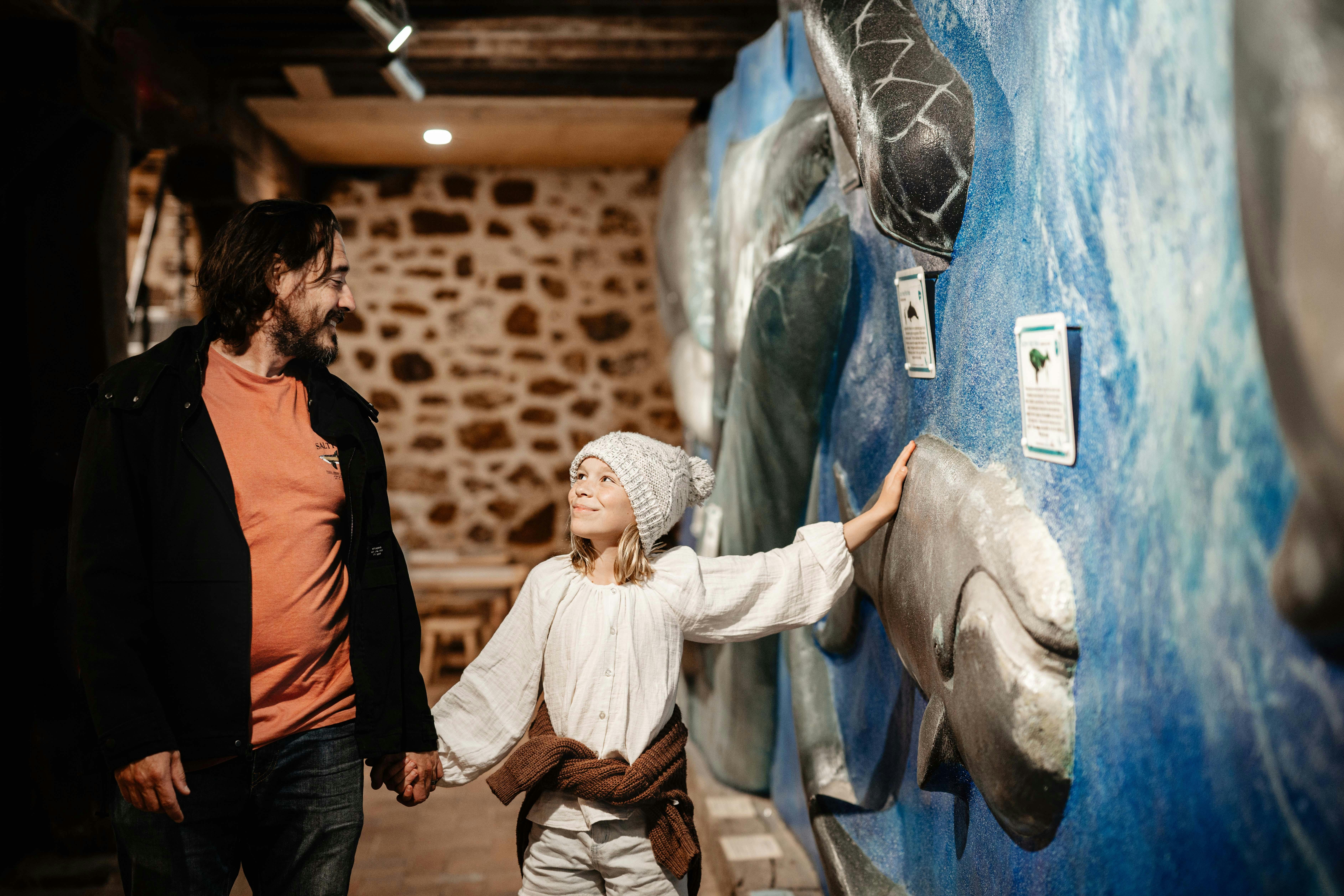 Touching the whale wall