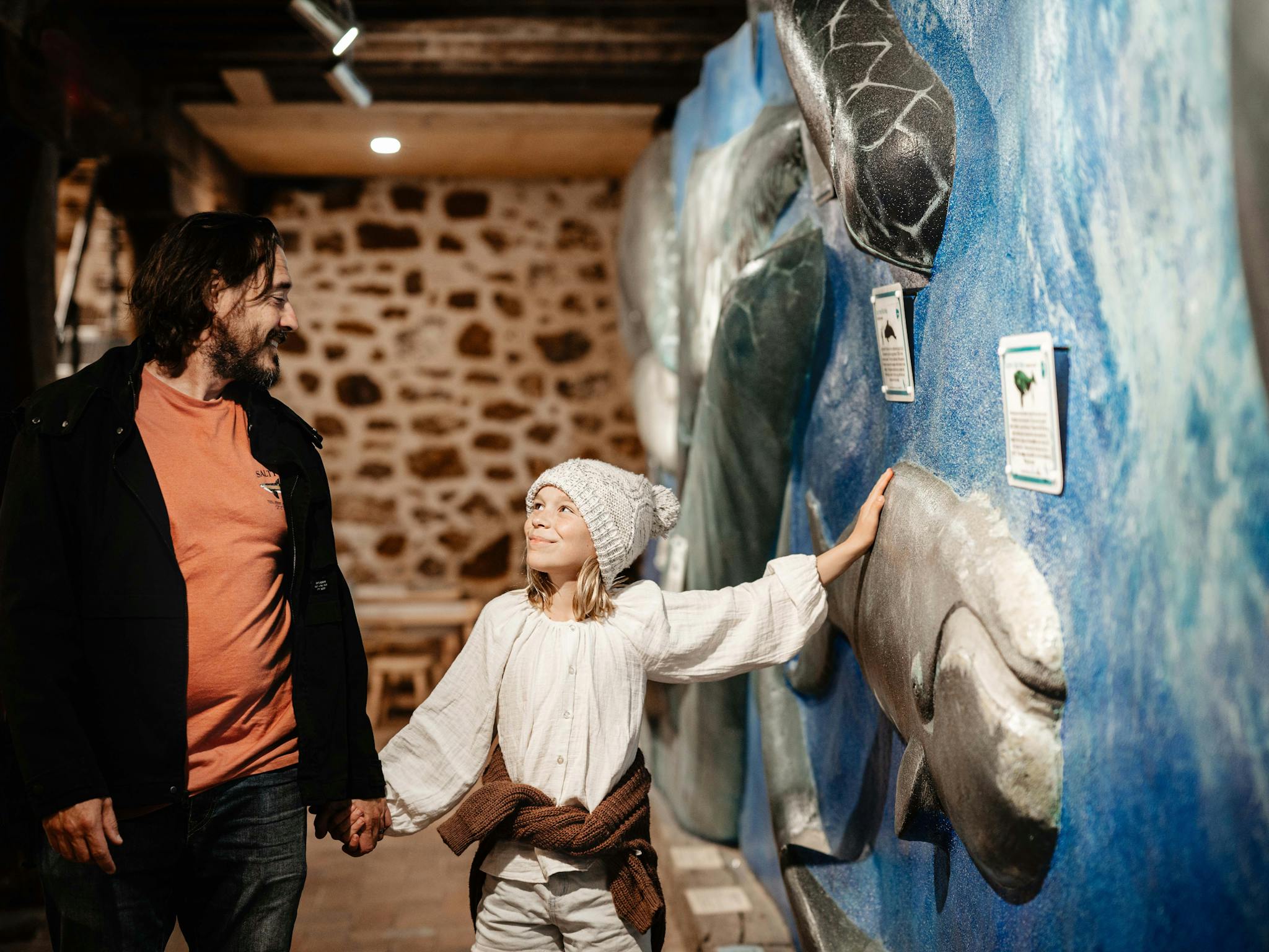 Touching the whale wall