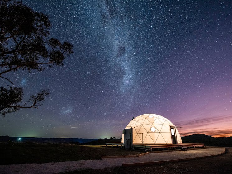 Milky way skyscape above glamping dome