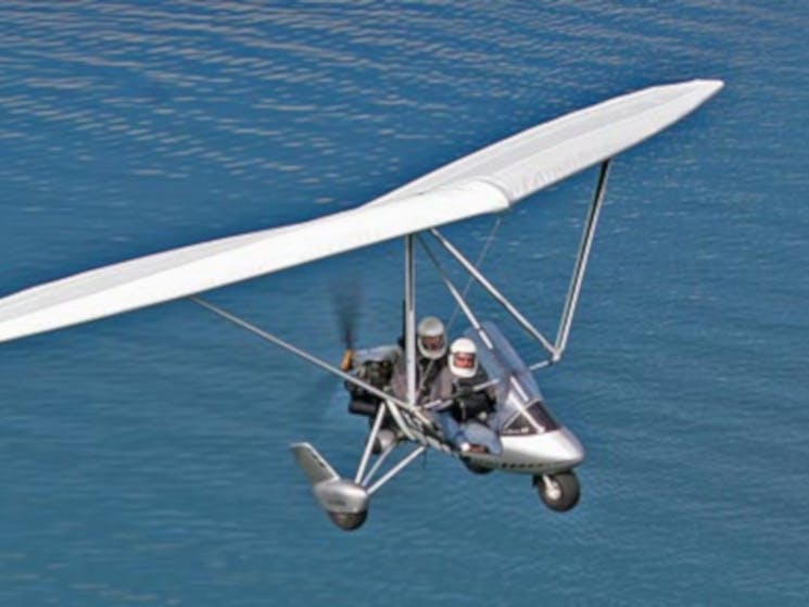 Flying above the ocean in a microlight