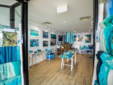 A look inside the gallery, showing prints and gifts of the ocean
