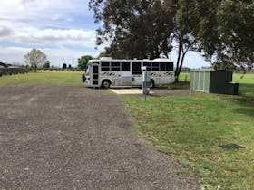 Park shot with custodian in foreground