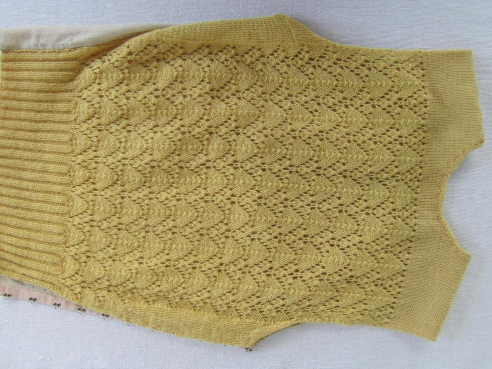 Hand knitted vest