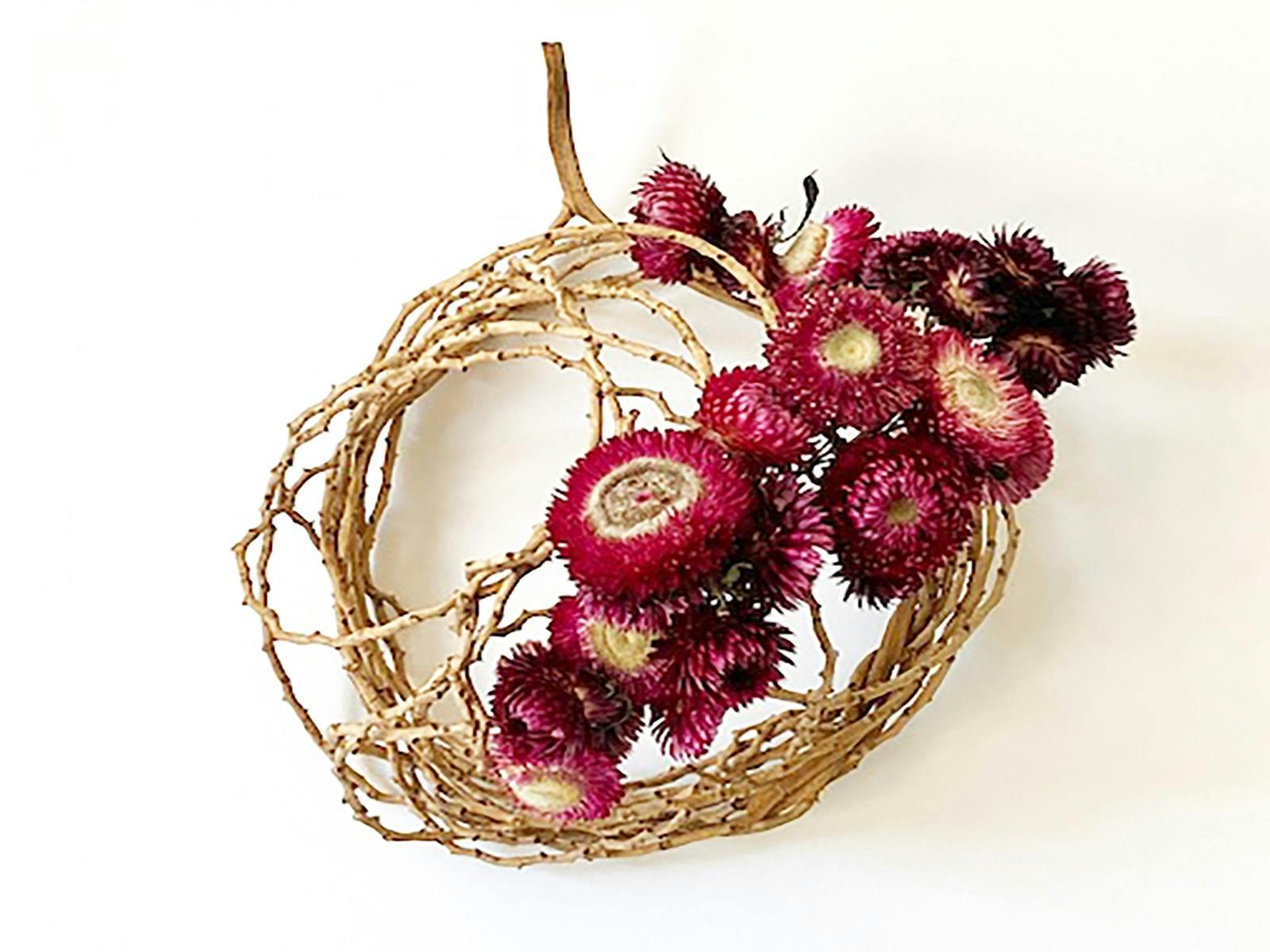 Fibre wall piece with flowers