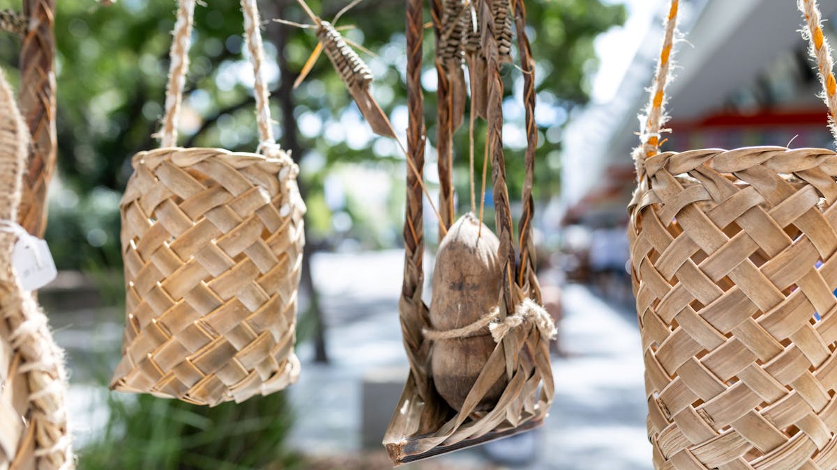 Intricately woven grass baskets showcasing local craftsmanship at the market