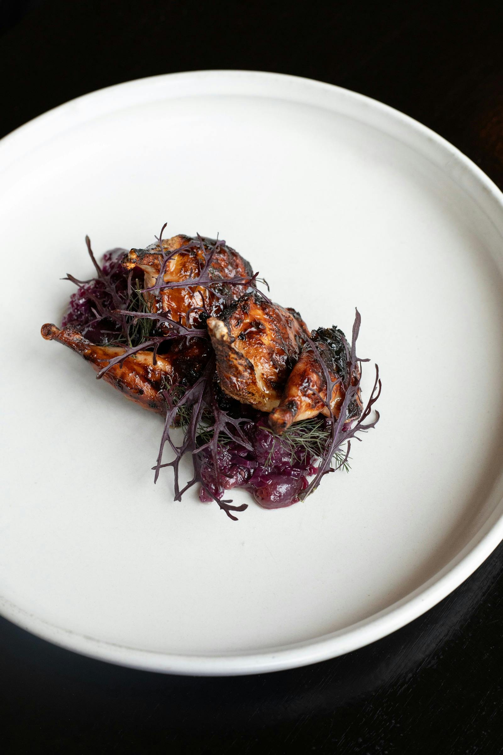 quail and red grapes