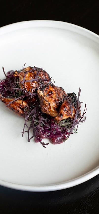 quail and red grapes