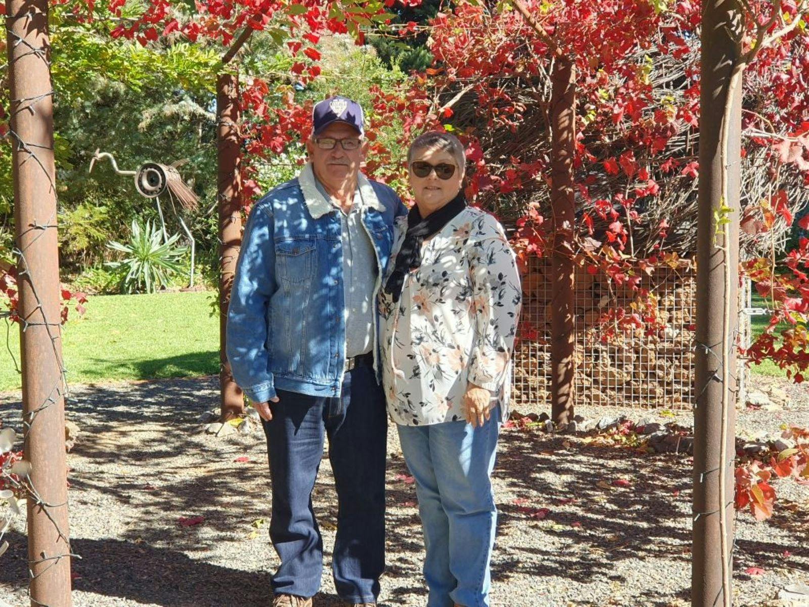 Guests looking radient under the autumn leaves