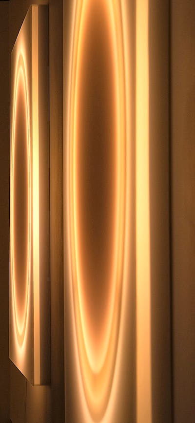 Visitor viewing wall artworks