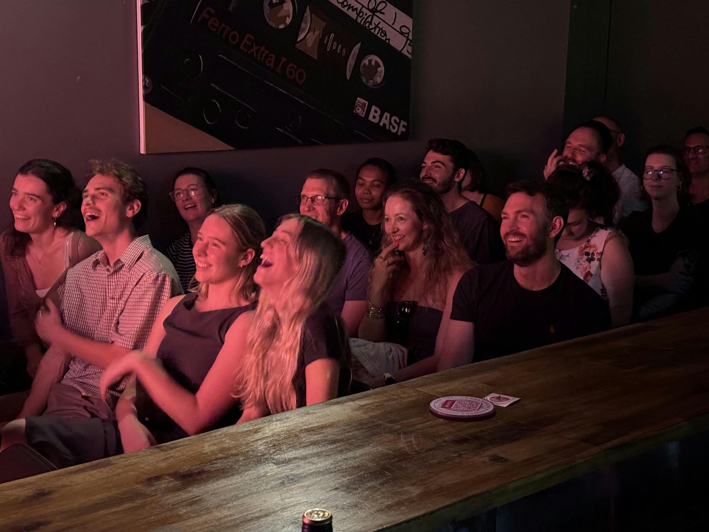 Comedy audience enjoying a live show at The Drummer in Glebe