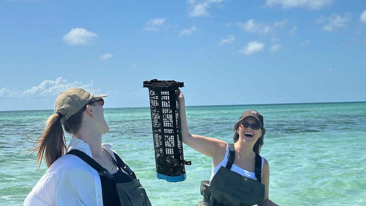 Girls laughing on oyster tour