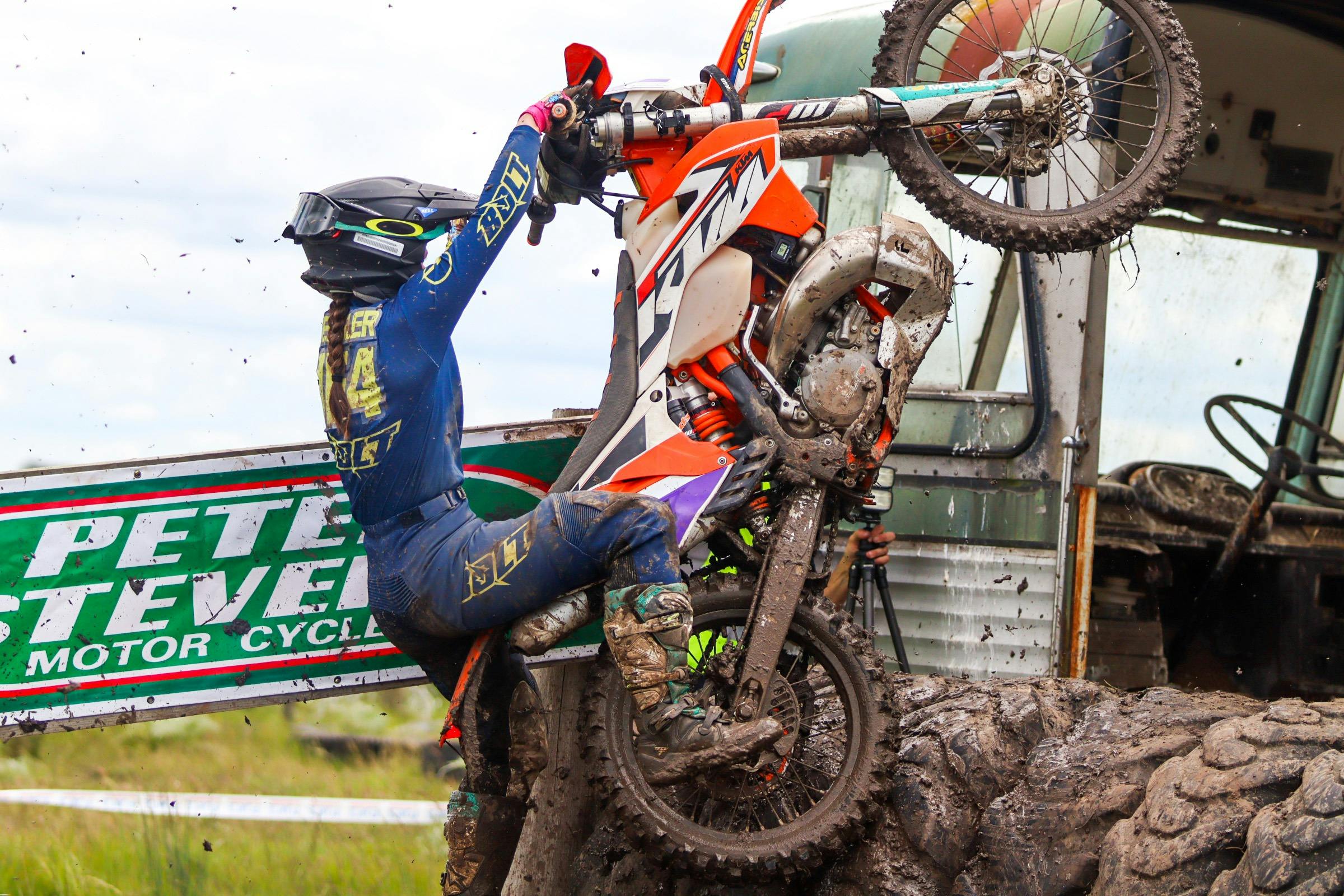 Flipping dirt bikes into the Bedford Bus in the Prologue area