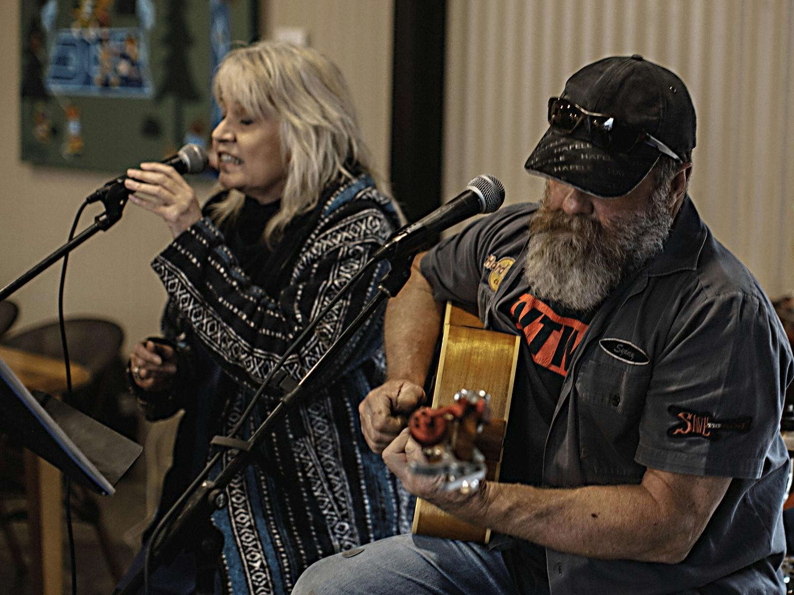 John & Jane Doe band playing music.